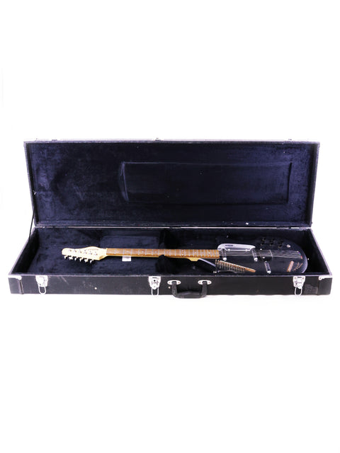 A black case containing a Jerry Jones Master Electric Sitar, displayed on a bright white background, highlighting its elegance.