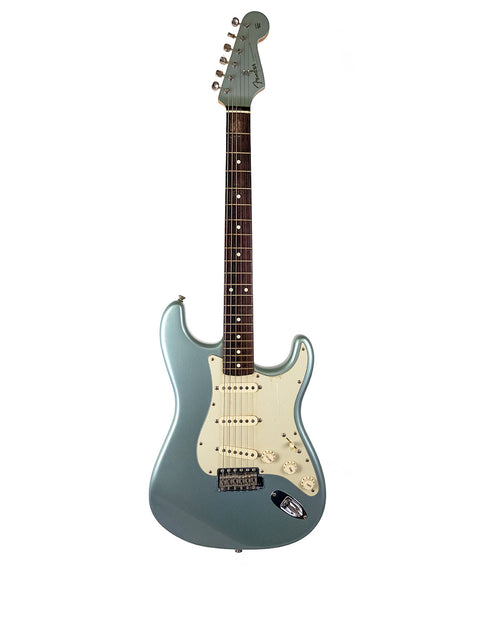 A blue Fender Stratocaster guitar with a white pickguard on a white background.