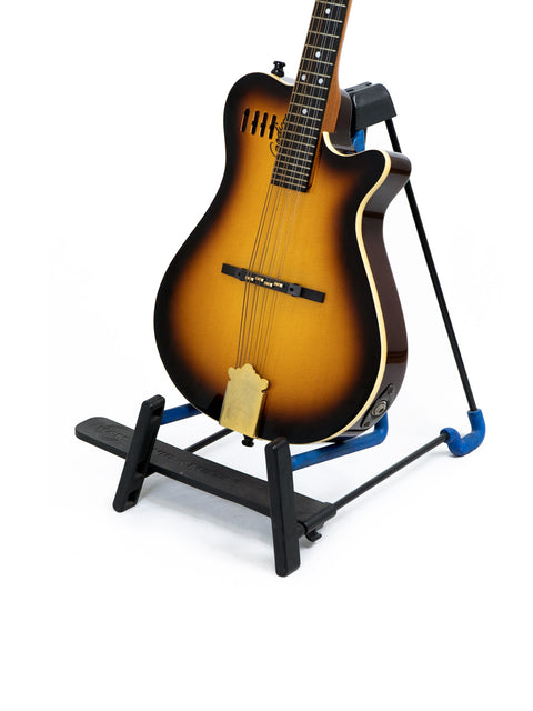 A blue stand holds a Godin A8 Mandolin, made in Canada in 2019, highlighting its unique shape and finish.