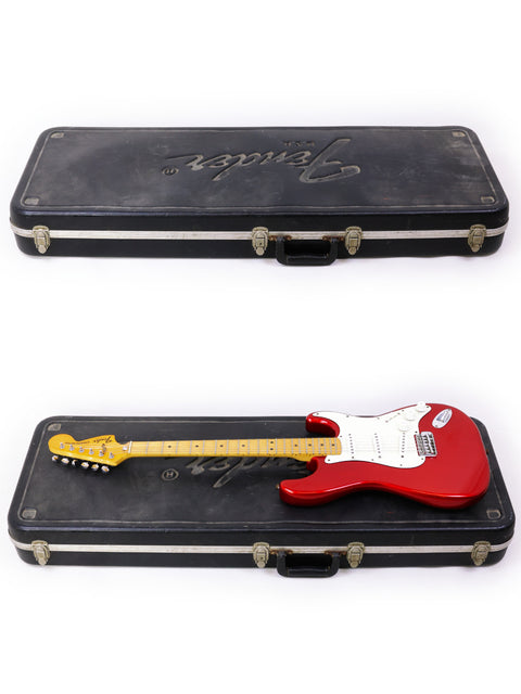 A classic 1979 USA Fender Stratocaster electric guitar, featuring its signature curves and striking color.