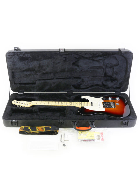 A guitar case containing a Fender Nashville B-Bender Telecaster, with a guitar stand positioned beside it for display.