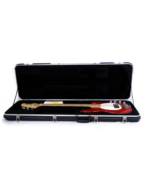 A hard case containing a Music Man Stingray 4 H Bass guitar from 2008, displayed on a white background.