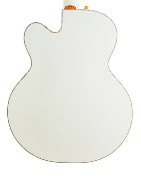 A mirror shaped like a white guitar with a gold head, reminiscent of the 2012 Gretsch G7593 White Falcon from Japan.
