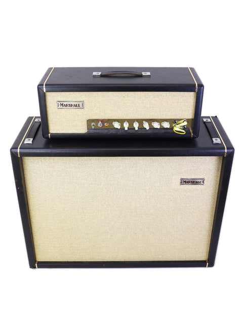 A pair of black and tan Marshall amplifiers, the JTM45 head atop the 412 cabinet, highlighting their limited edition status from 2002.