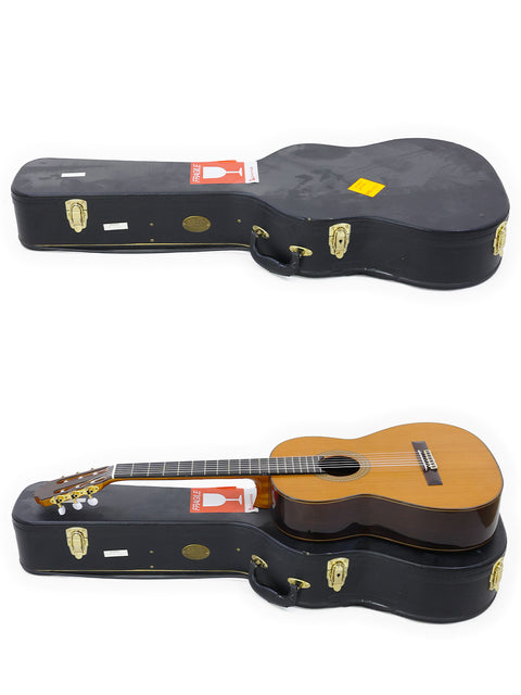 A pair of guitars in their cases, featuring a Francisco Esteve 9C/B Classical from Spain, 2021, next to a guitar case.