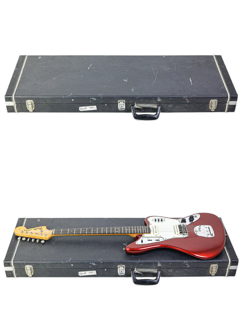 A pair of vintage L-Series Fender Jaguar guitars in a case, set on a white background, highlighting their 1964 craftsmanship.
