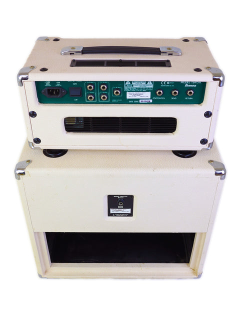 A pair of white amplifiers, one on top of the other, showcasing an Ibanez TSA15 Tube Screamer head and an 80W cabinet.