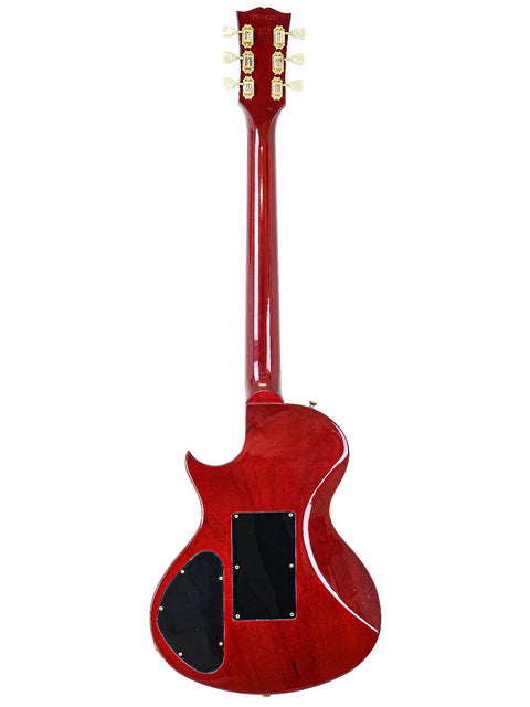 A red electric guitar with a black body and pickguard, showcasing the Gibson Nighthawk model from 1997, USA-made.