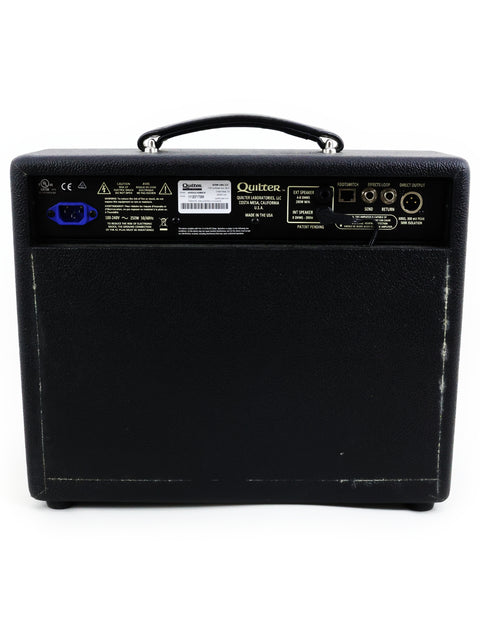 A sleek black amplifier with a blue logo, representing the Quilter Aviator Gold 8” Combo, made in the USA, 2018.