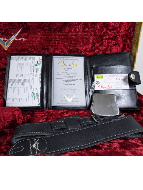 A sleek black leather wallet features a passport and a matching passport holder, perfect for organized travel.
