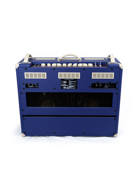 A striking blue Vox AC 30 C2 Limited Edition amplifier is showcased on a pristine white background.