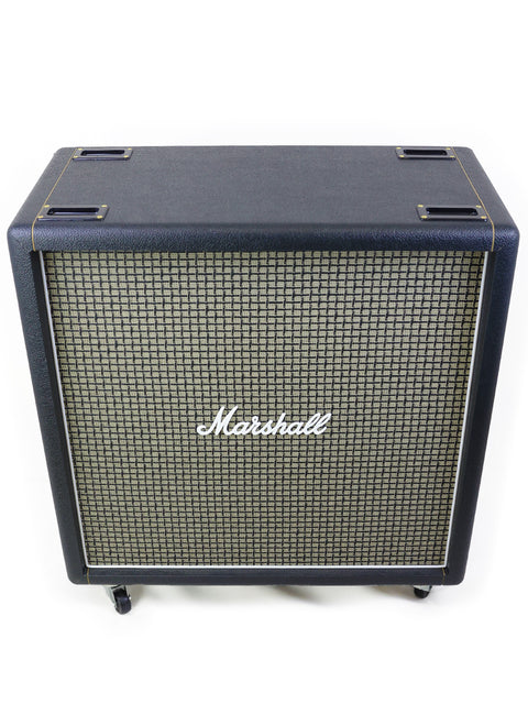 A striking image of black and gold Marshall amplifiers, featuring the JTM45 model, crafted in the UK in 2017.