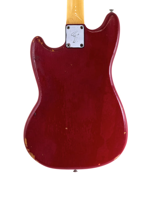A striking red 1976 Fender Bronco electric guitar displayed on a white background.