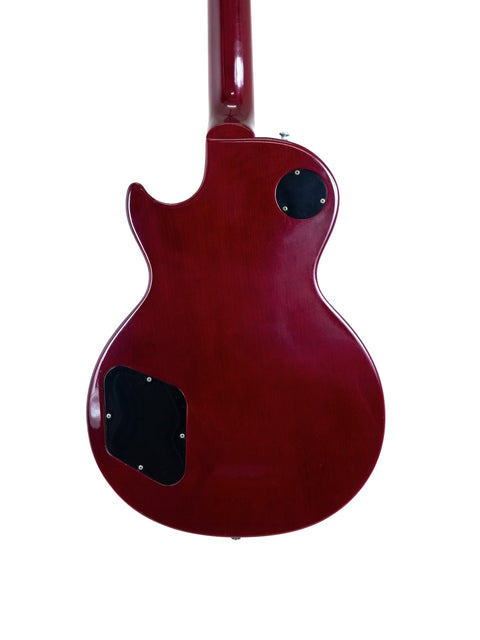 A striking red Gibson Les Paul Standard electric guitar (1998) with a contrasting black pickguard.