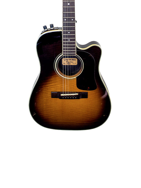 A stunning 1984 Washburn Mirage Deluxe guitar made in Japan, featuring a beautiful finish and elegant design.
