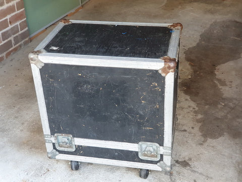 A sturdy flight case on wheels, designed for the Mesa Boogie Mark III, positioned on the ground, highlighting its vintage 1987 style.