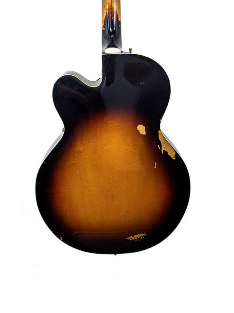 A sunburst-finished 1964 Gretsch Double Anniversary 6117 guitar with a classic black pickguard.