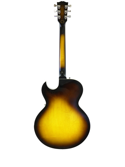 A sunburst-finished Gibson ES-135 guitar from 2001, made in the USA, displaying a stunning gradient of warm colors.

