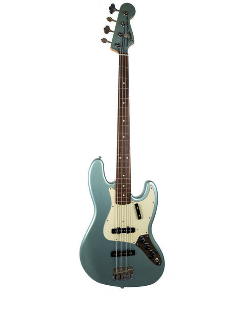 A teal electric bass guitar with a white pickguard isolated on a white background.