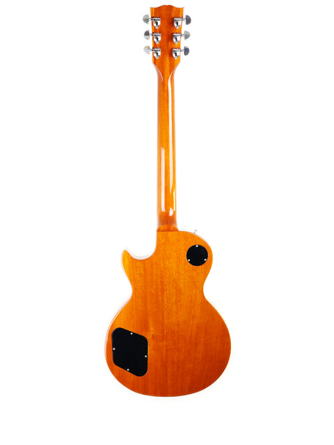 A vibrant orange Gibson Les Paul Standard guitar (2013) with a contrasting black pickguard.