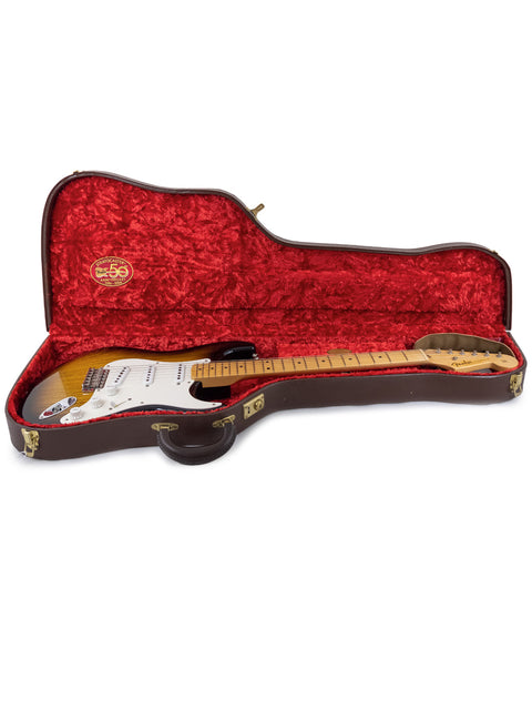 A vibrant red and black guitar case, specifically made for the Fender Custom Shop 1954 Strat 50th Anniversary model.
