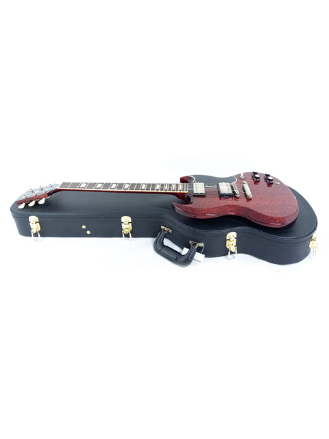 A vibrant red electric guitar, the Gibson Custom ’61 Les Paul SG Standard, displayed in its case on a white backdrop.