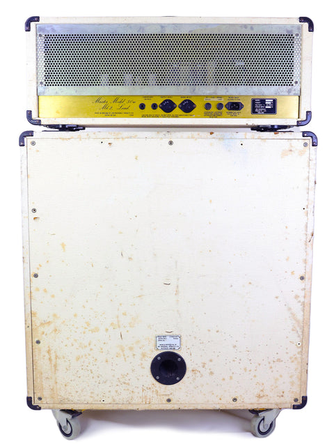 A white Marshall amplifier topped with a yellow speaker, showcasing the 1984 JCM800 2204 tube head and quad cabinet.
