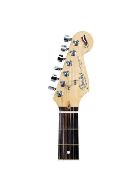 A white background showcases a Fender 40th Anniversary American Standard Stratocaster guitar with its logo.