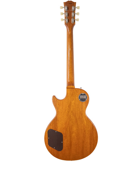 A wooden-bodied Gibson Custom Shop LPR-7 1957 Les Paul Goldtop Reissue guitar, showcasing its elegant neck.