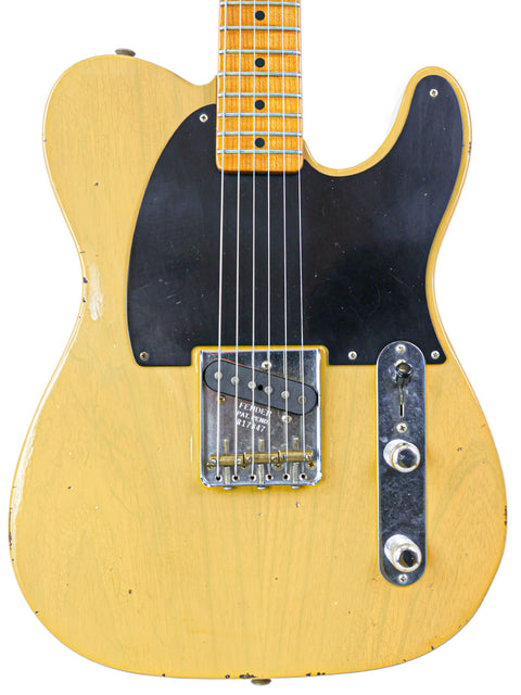 A yellow Fender Master Built Jason Smith Esquire guitar with a black pickup, crafted in the USA in 2018.
