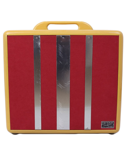 A yellow and red Fender guitar amplifier with a handle.
