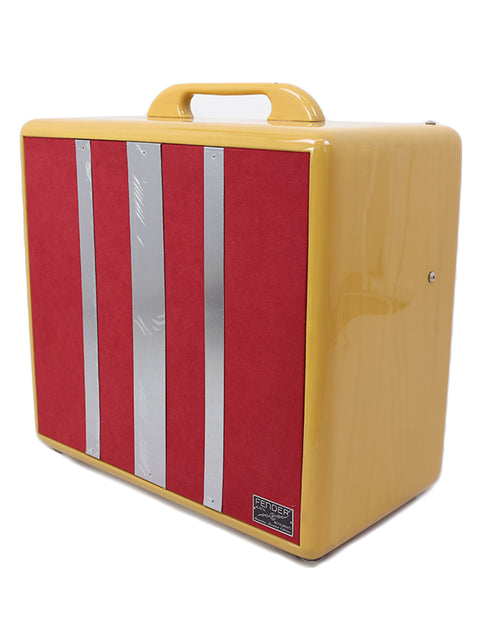 A yellow and red vintage-style Fender guitar amplifier cabinet with handle.