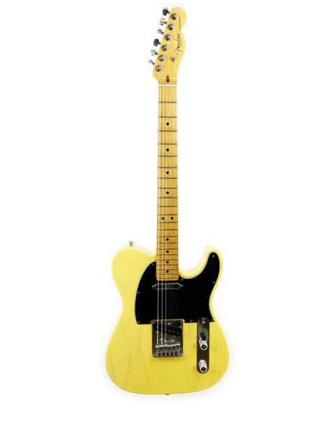 A yellow electric guitar with a maple neck and black pickguard against a white background.