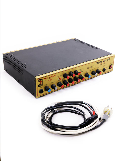 Gold and black amplifier with wires and power cord, showcasing the Eden World Tour 800 Head and Epifani 600w Bass Cabinet.