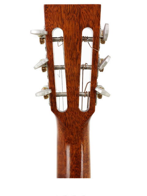 Acoustic guitar headstock with visible tuning pegs, captured in Gilet Bay State, Australia, during the year 2018.