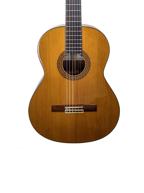 Alhambra C-Series ORO classical guitar displayed on a white background, highlighting its elegant design from Spain, 2005.