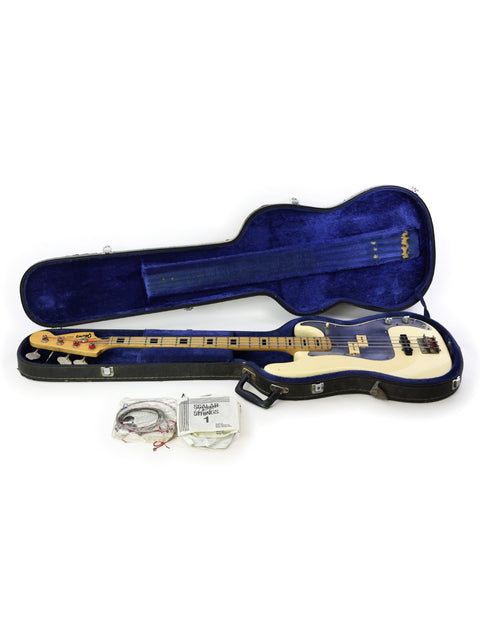 An Ibanez Silver Series P/J Bass guitar from 1978, resting in its case alongside various musician accessories.