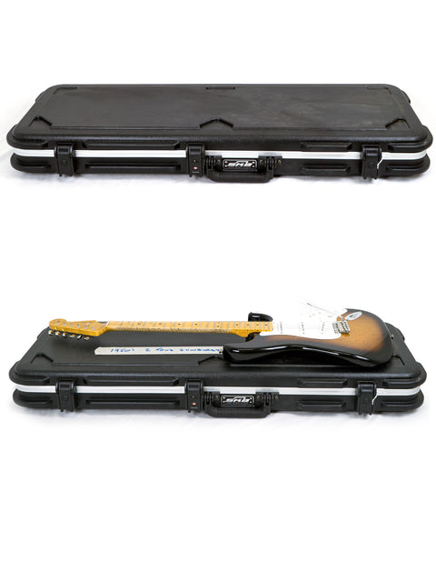 An electric guitar in its open hard case against a white background.