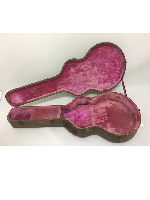 Antique guitar case lined with pink velvet, housing a classic 1953 Gibson ES 175 DN from the USA.