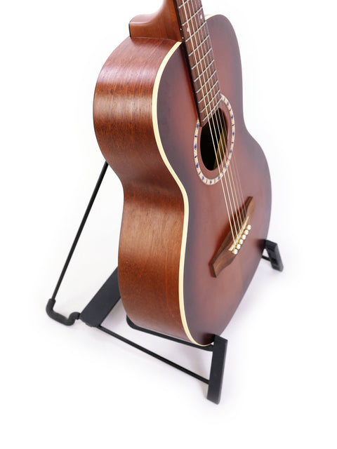 Art & Lutherie AMI Cedar – Canada 2007, displayed on a stand, ready for playing or display.