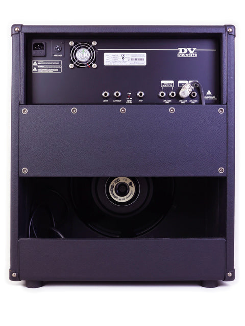 Back of a DV Mark guitar amplifier showing control inputs, a fan, and a speaker.