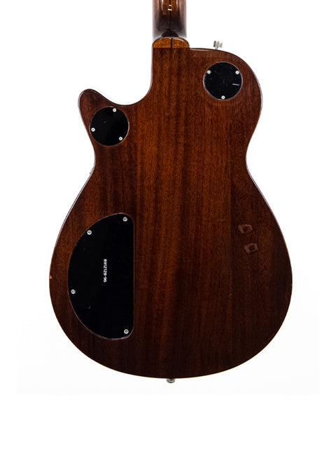  Back view of a 1989 Gretsch Duo Jet 6128 guitar, highlighting its elegant wooden body.