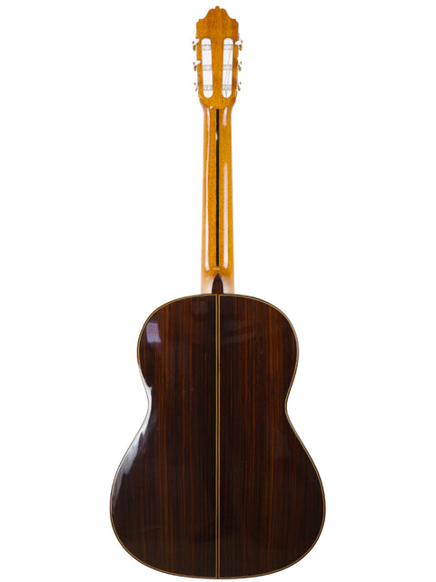 Back view of a Francisco Esteve 9C/B acoustic guitar, showcasing its elegant wooden back, crafted in Spain, 2021.
