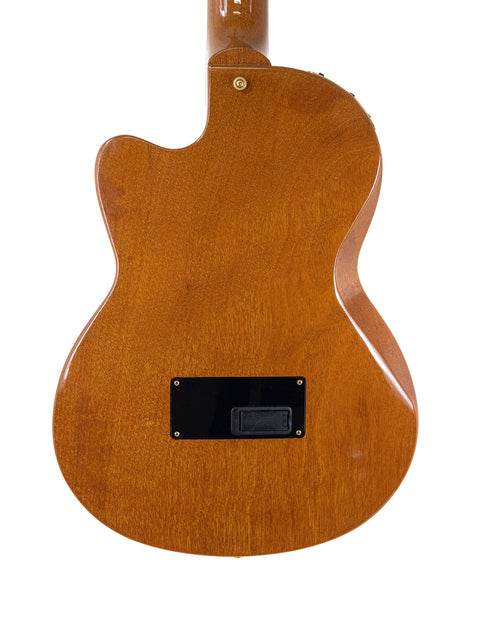 Back view of a Gibson Chet Atkins CEC Classical Electric Guitar, showcasing its elegant wooden body from 2001.
