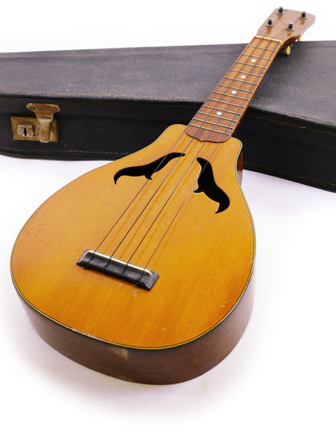 Beautifully crafted 1927 Harmony Roy Smeck Vita-uke ukulele with a case, perfect for collectors, set on a white background.
