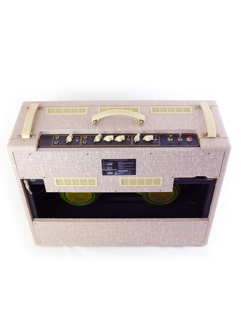 Beige Vox AC30HW2 amplifier featuring a vibrant yellow cover, blending classic looks with a pop of color.