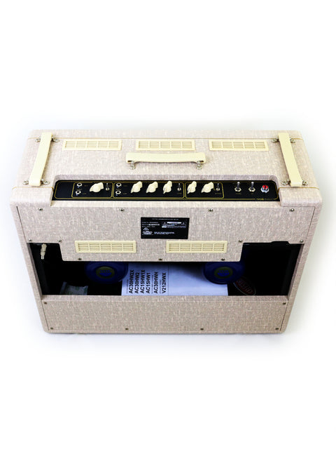 Beige Vox AC30 HW2X amplifier with a white cover, blending vintage charm and contemporary style for musicians.