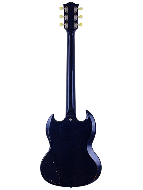 Black Gibson Custom Shop '64 SG guitar with a sleek black body and neck, showcasing its elegant design and craftsmanship.