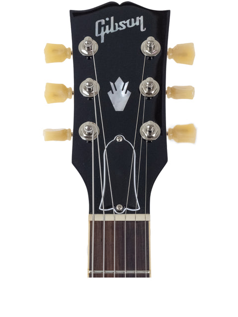 Black Gibson Les Paul Standard Jr guitar, highlighting its iconic shape and craftsmanship.
