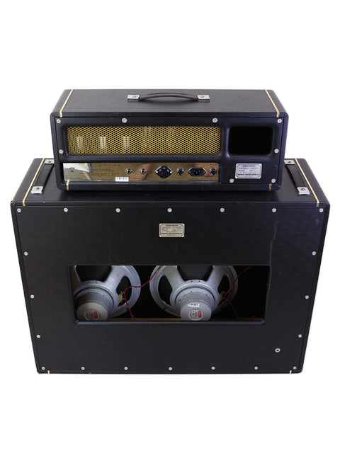 Black Marshall amplifier featuring two speakers and a cabinet, highlighting the 2002 Limited Edition JTM45 Head and 412 Cabinet.